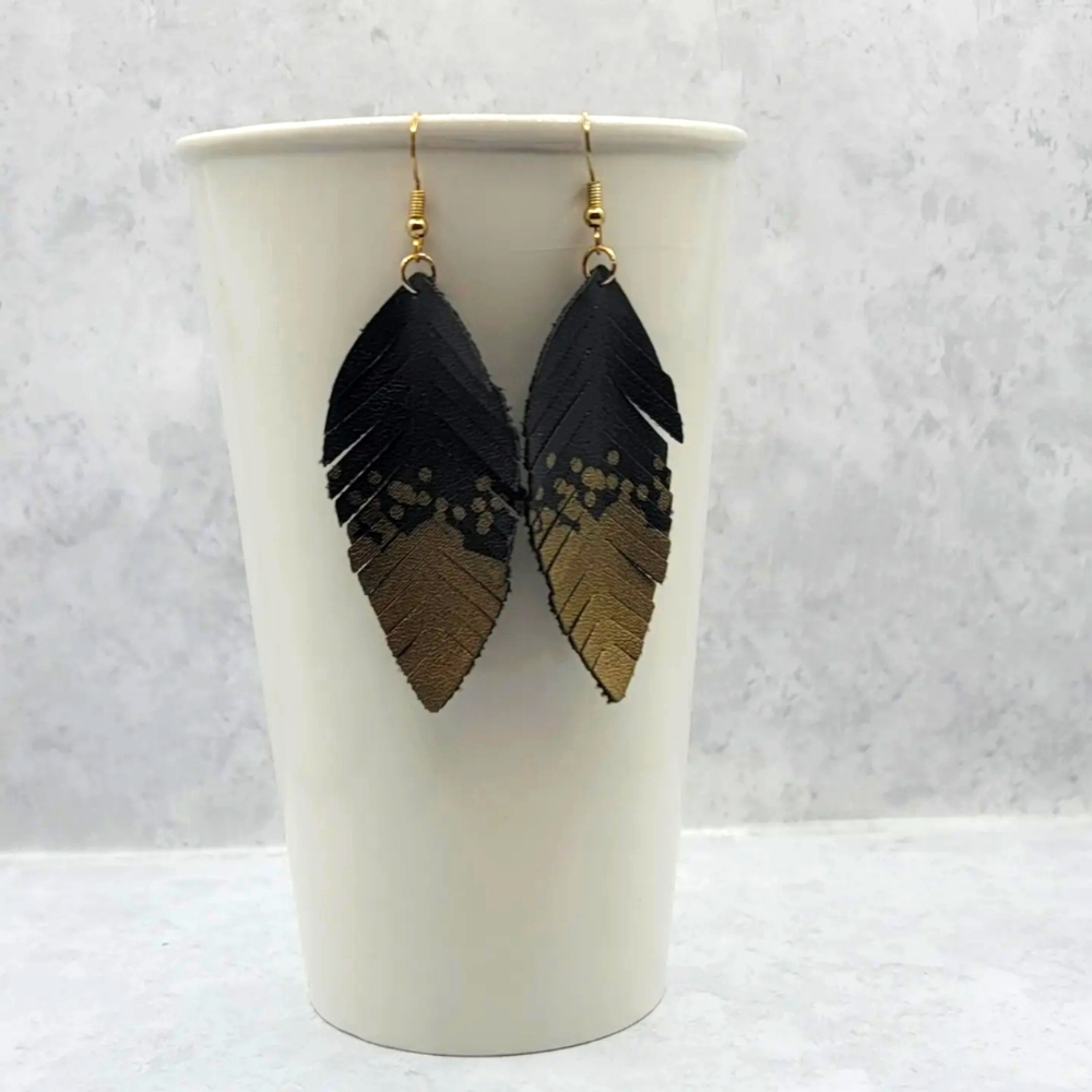 Faux leather feather earrings.